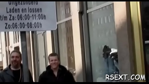 Horny slut gets down on knees and sucks a large jock wildly