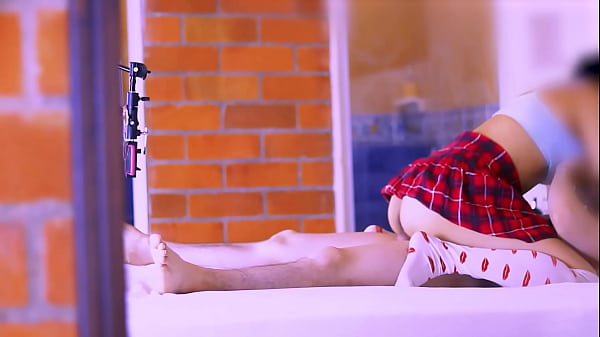 The stepmother and the student shared a soft laugh in the kitchen.